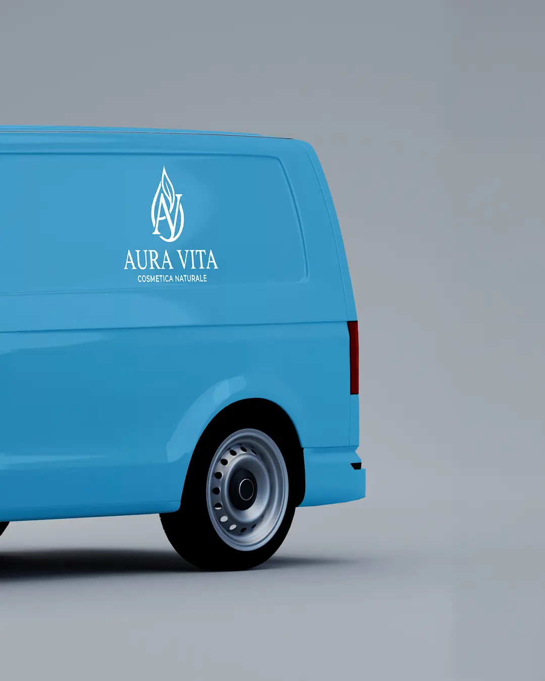 Un furgone blu chiaro viene mostrato lateralmente con il logo di Aura Vita Cosmetica Naturale e il disegno di una foglia in bianco sulla parte superiore sinistra del veicolo. Lo sfondo è grigio chiaro.